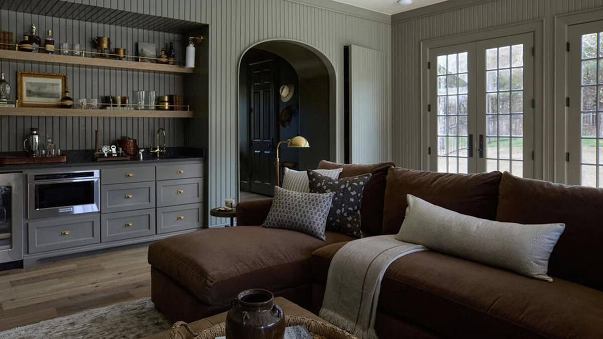 Pool House Living Room with Wet Bar and Arched Doorway