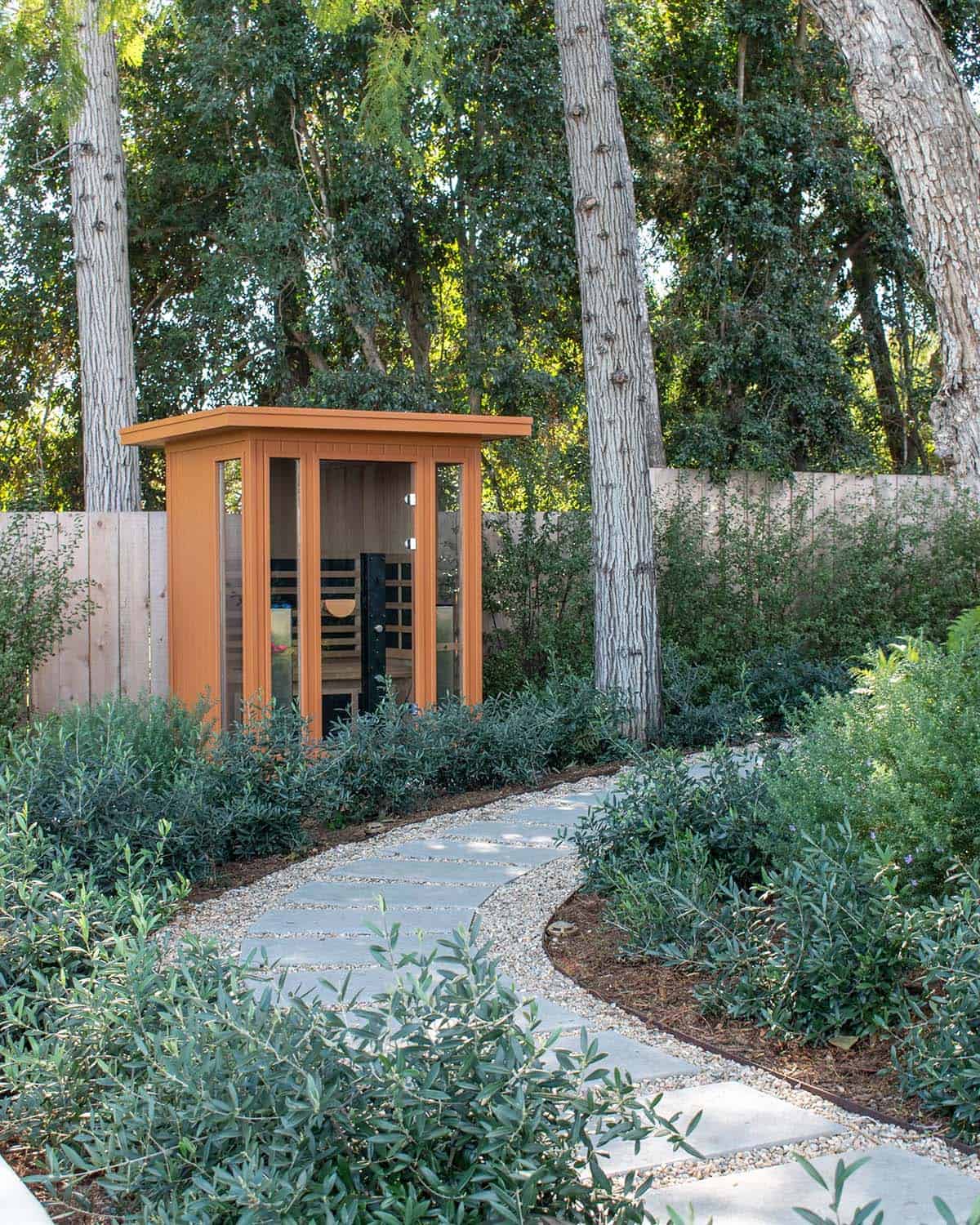 modern coastal property with a crushed gravel pathway