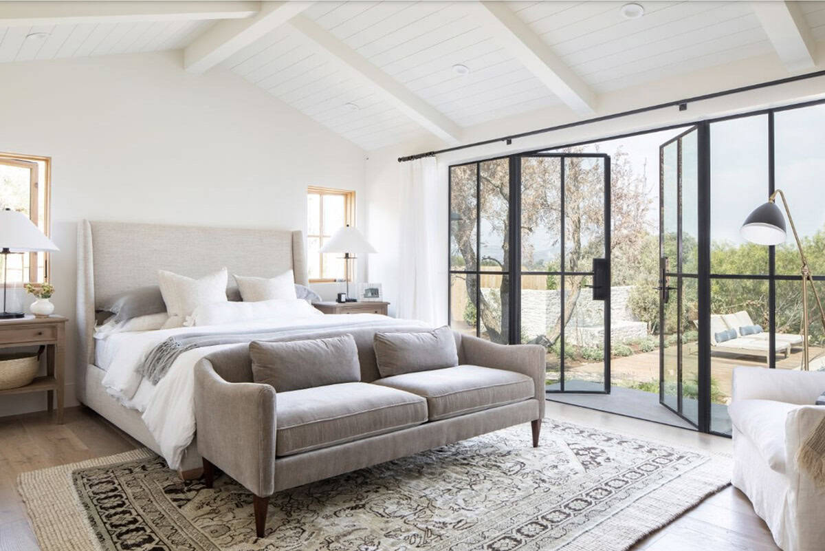 Bedroom with French doors opening to the garden