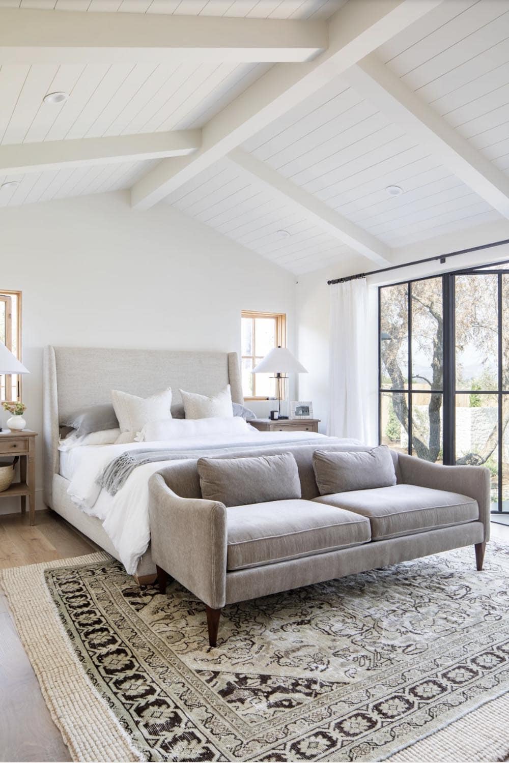 contemporary coastal style bedroom with french doors