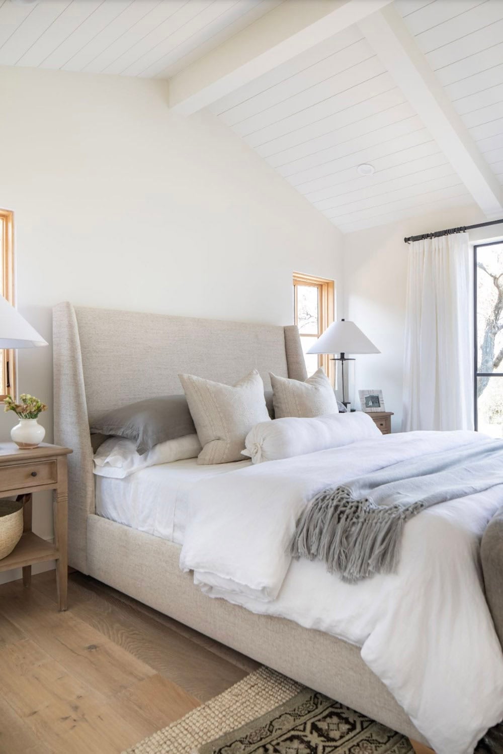 contemporary coastal style bedroom with french doors