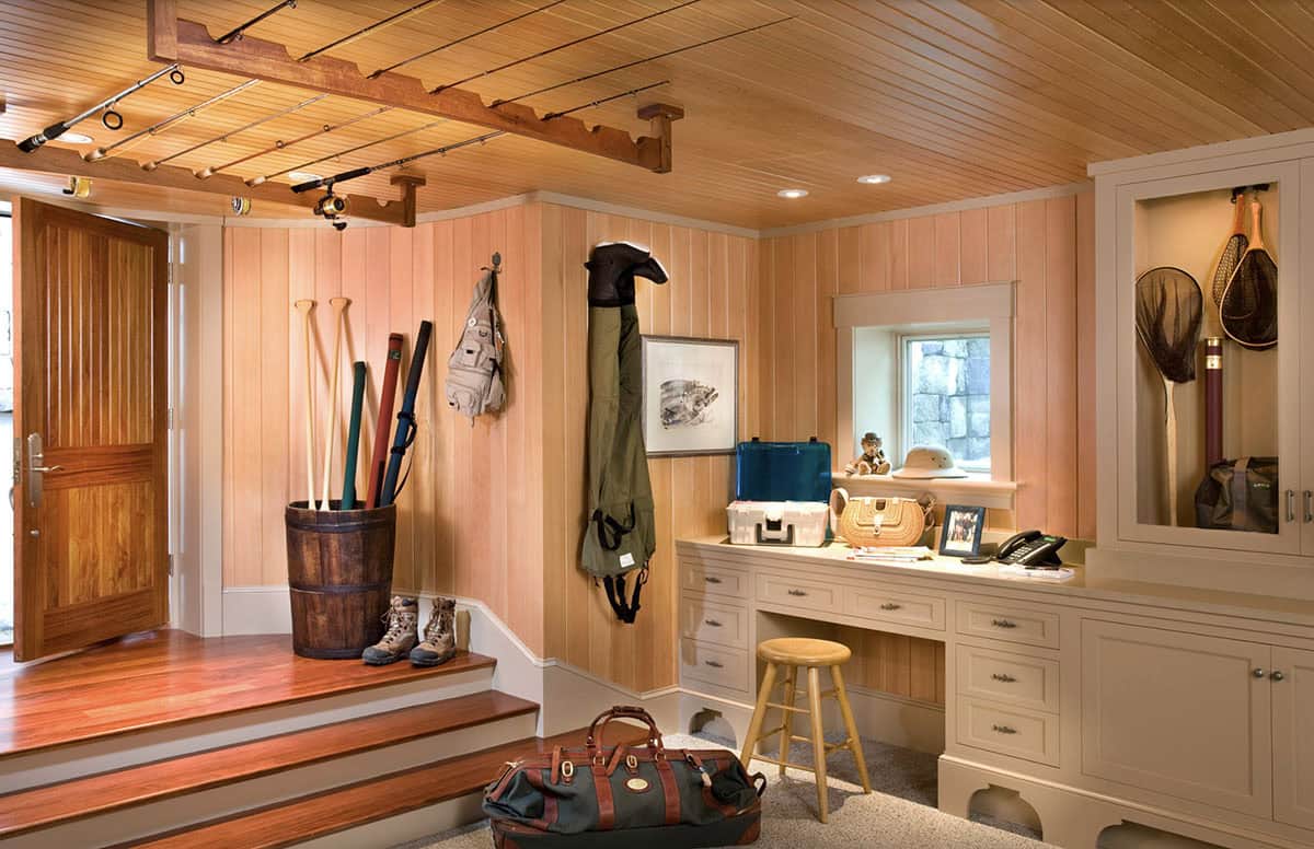 Cedar-Lined Fishing Mudroom With Ceiling Rod Rack, Built-In Desk, and Barrel Storage