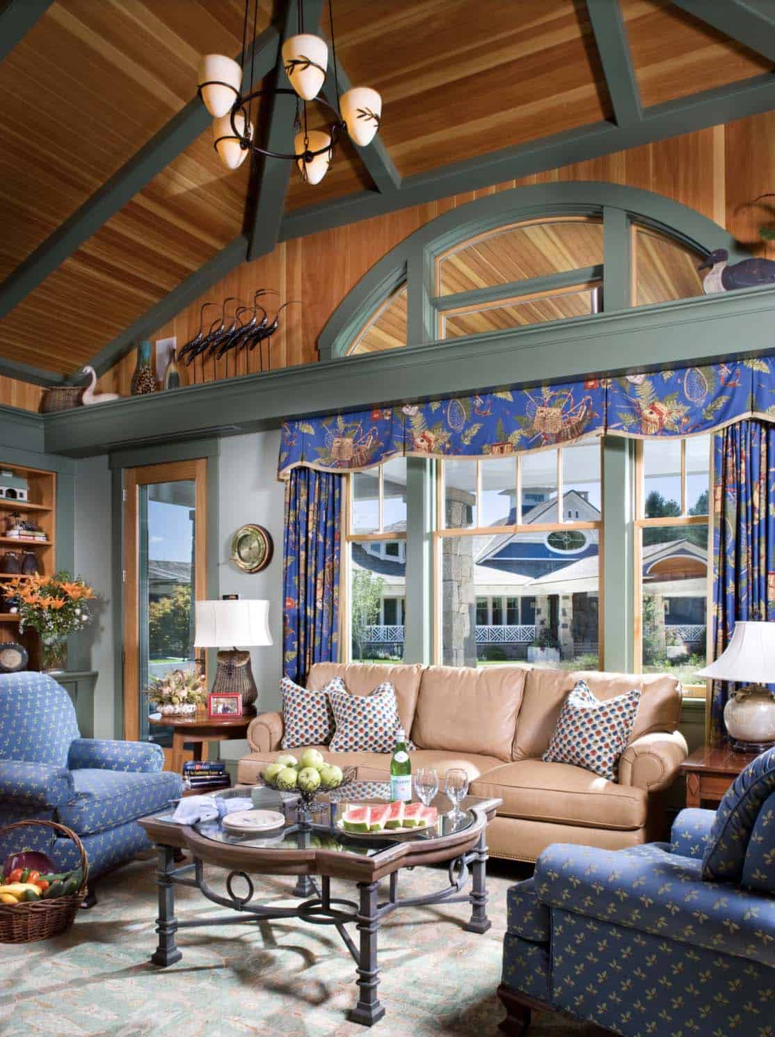 transitional style guest house living room with large windows and a view