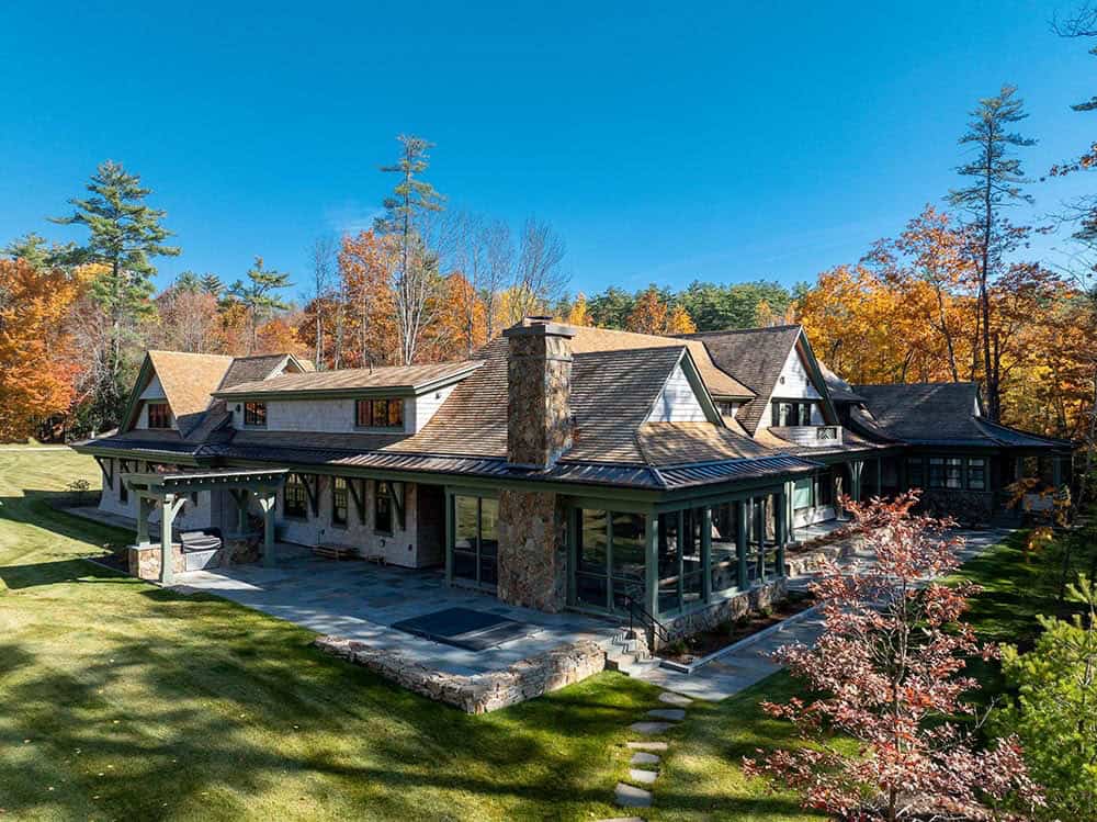 Aerial rear view of East Cove Estate showing screened porch and slate patio