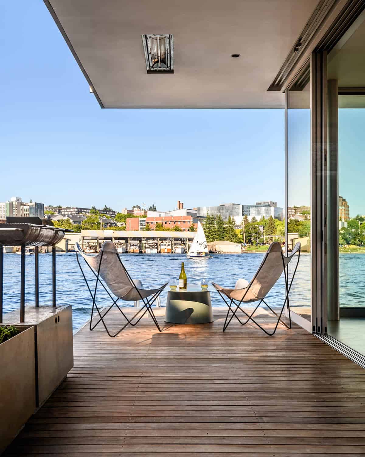 Waterfront deck with butterfly chairs overlooking Portage Bay, Seattle