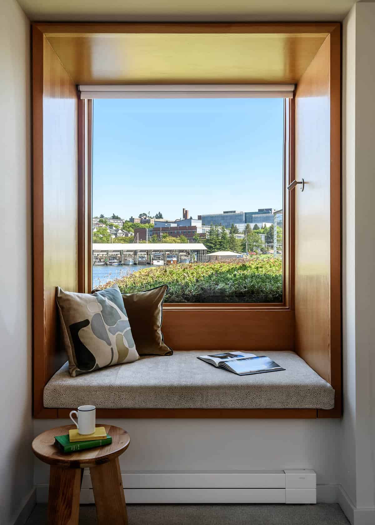 Built-in window seat with water and marina views in Seattle floating home
