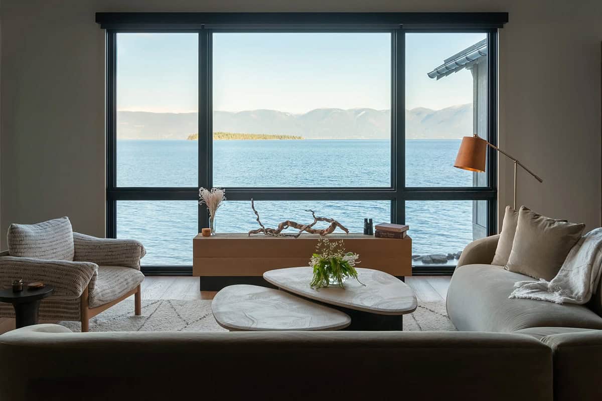 Living room seating area with panoramic lake views