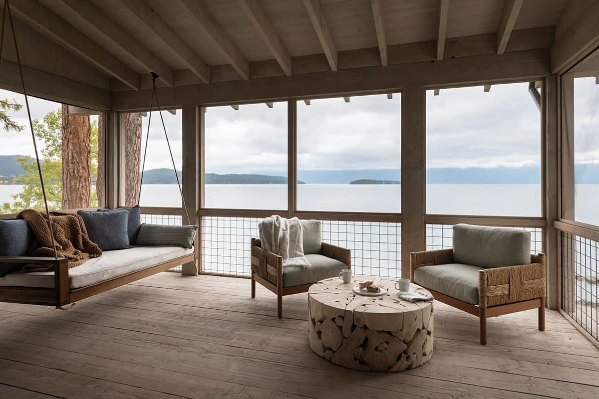Screened porch with daybed swing and lake views