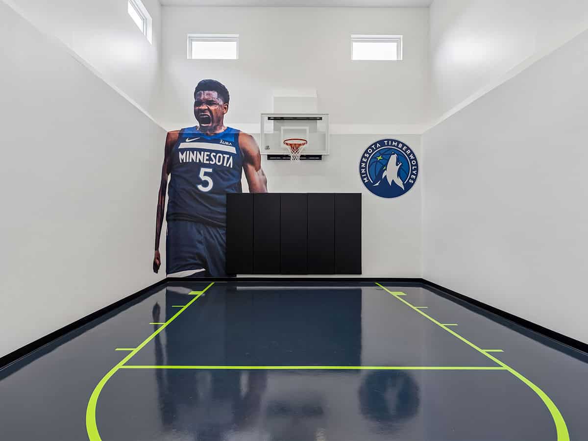 Close-up of mini basketball court mural and hoop