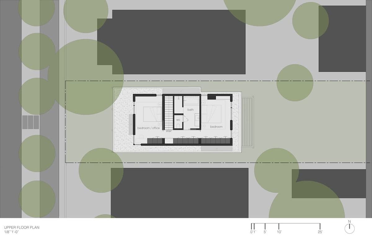 Architectural upper floor plan showing two bedrooms, bathroom, and perimeter skylight zone