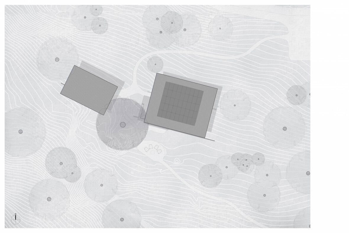 Site plan showing two-pavilion layout with topographic contours and tree canopy, Orcas Island hillside