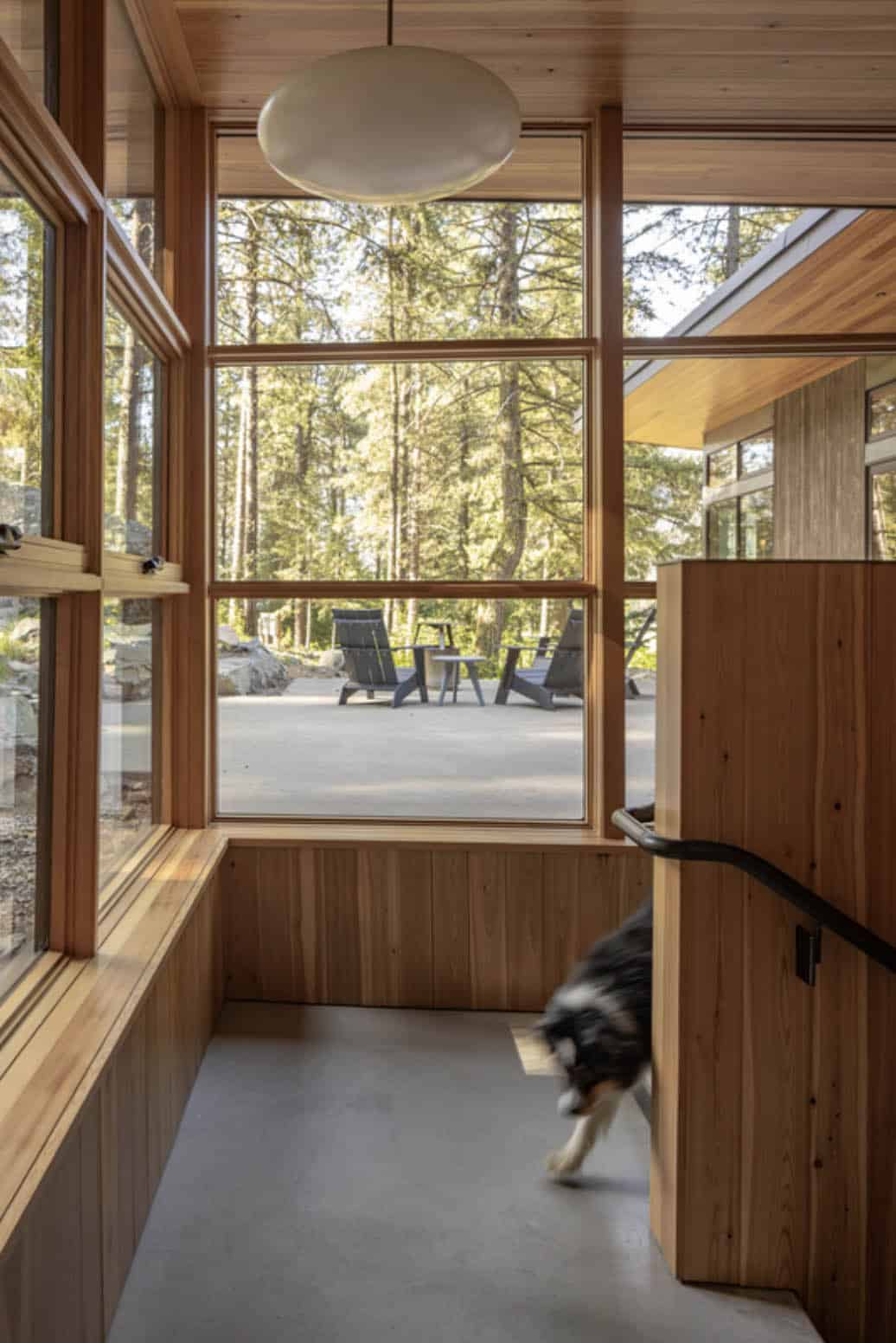 Douglas fir nap room with built-in bench seating and forest views