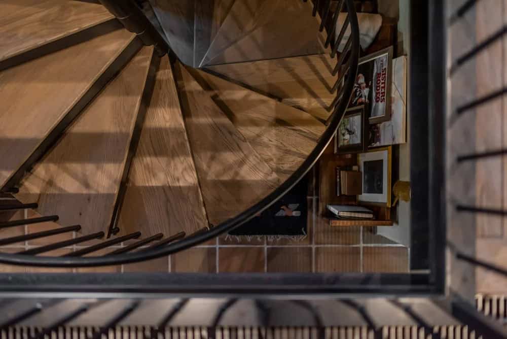 Aerial view down a wooden spiral staircase