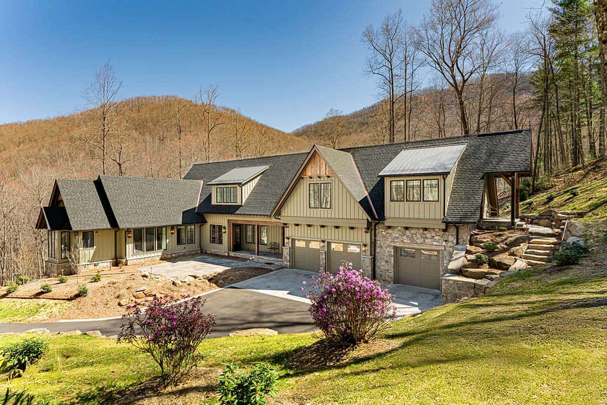 Rustic mountain home with three-car garage and mountain views
