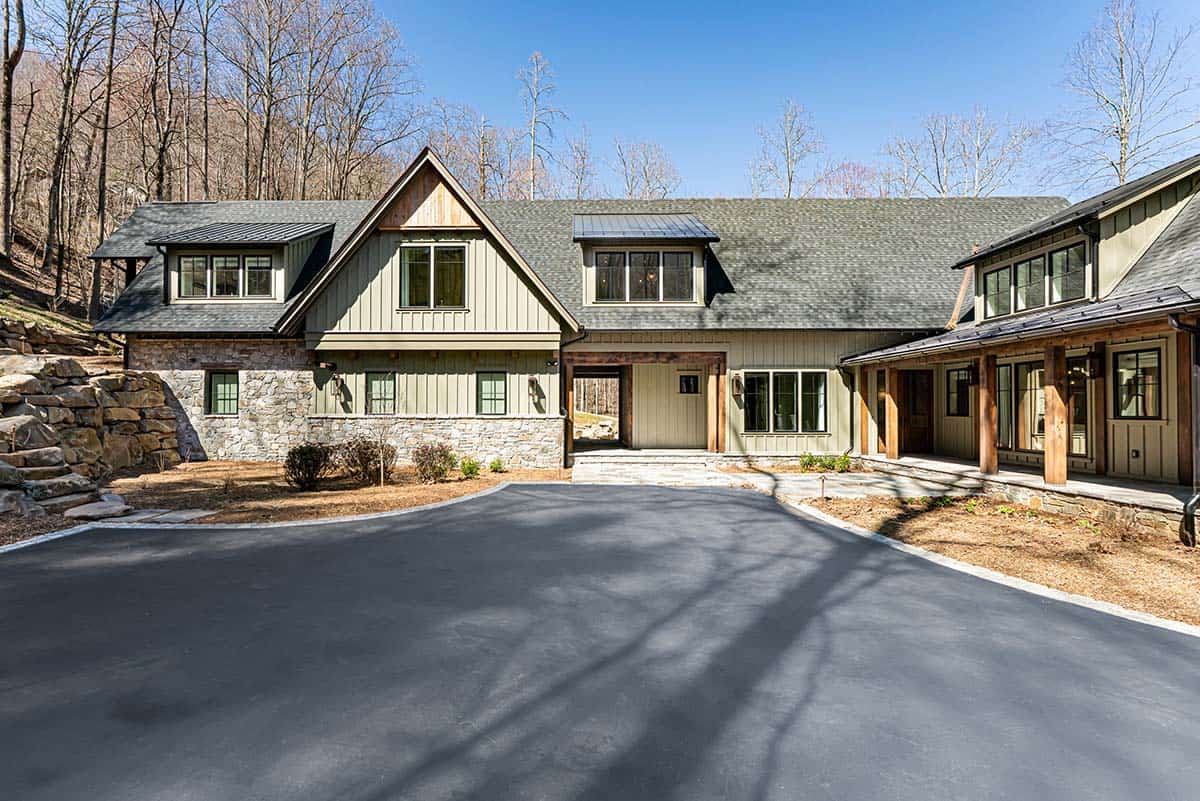 Front exterior with board and batten siding and timber accents