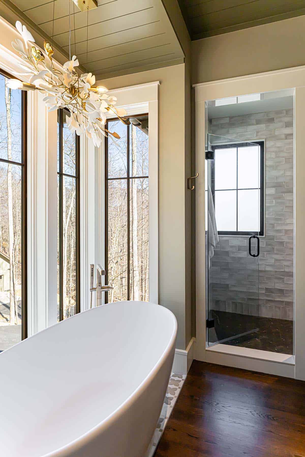 Freestanding tub with view into glass walk-in shower