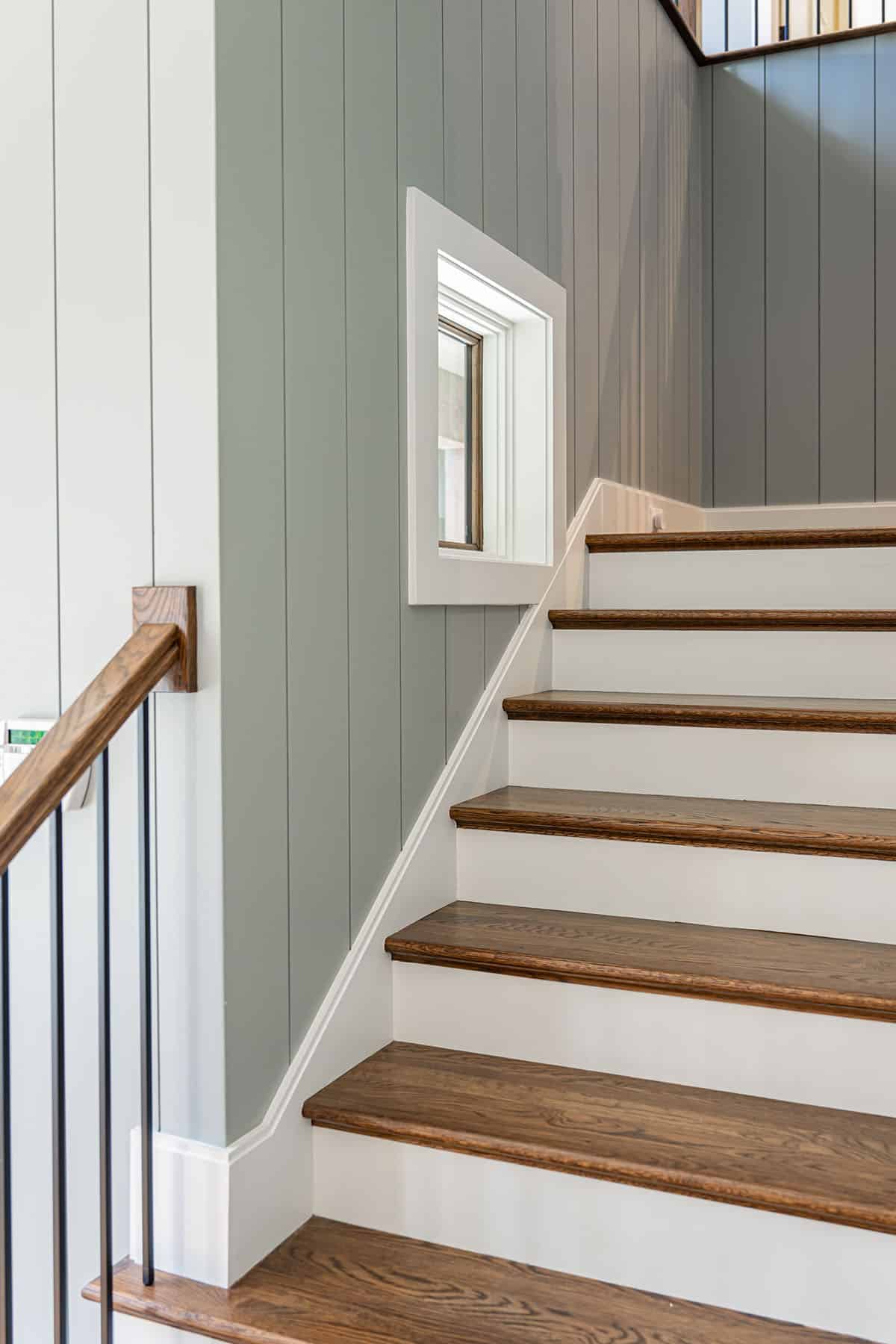 Staircase detail with wood treads and white risers