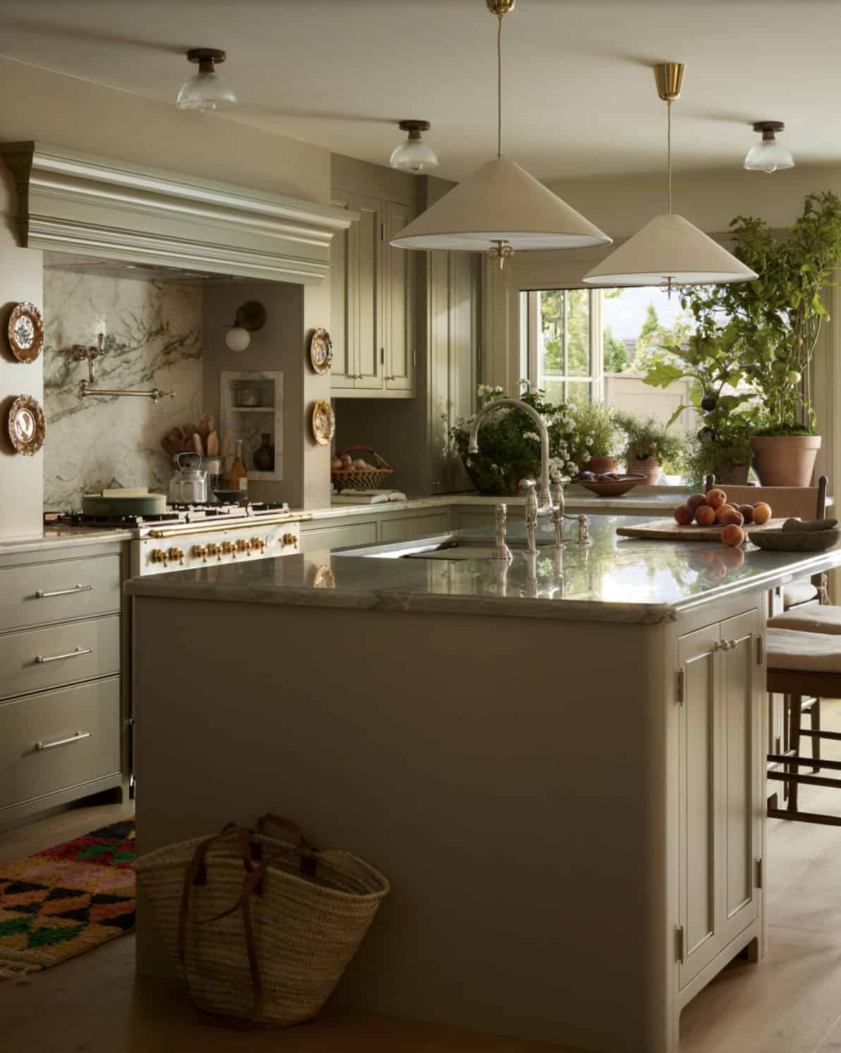 Kitchen island with woven basket and garden window view
