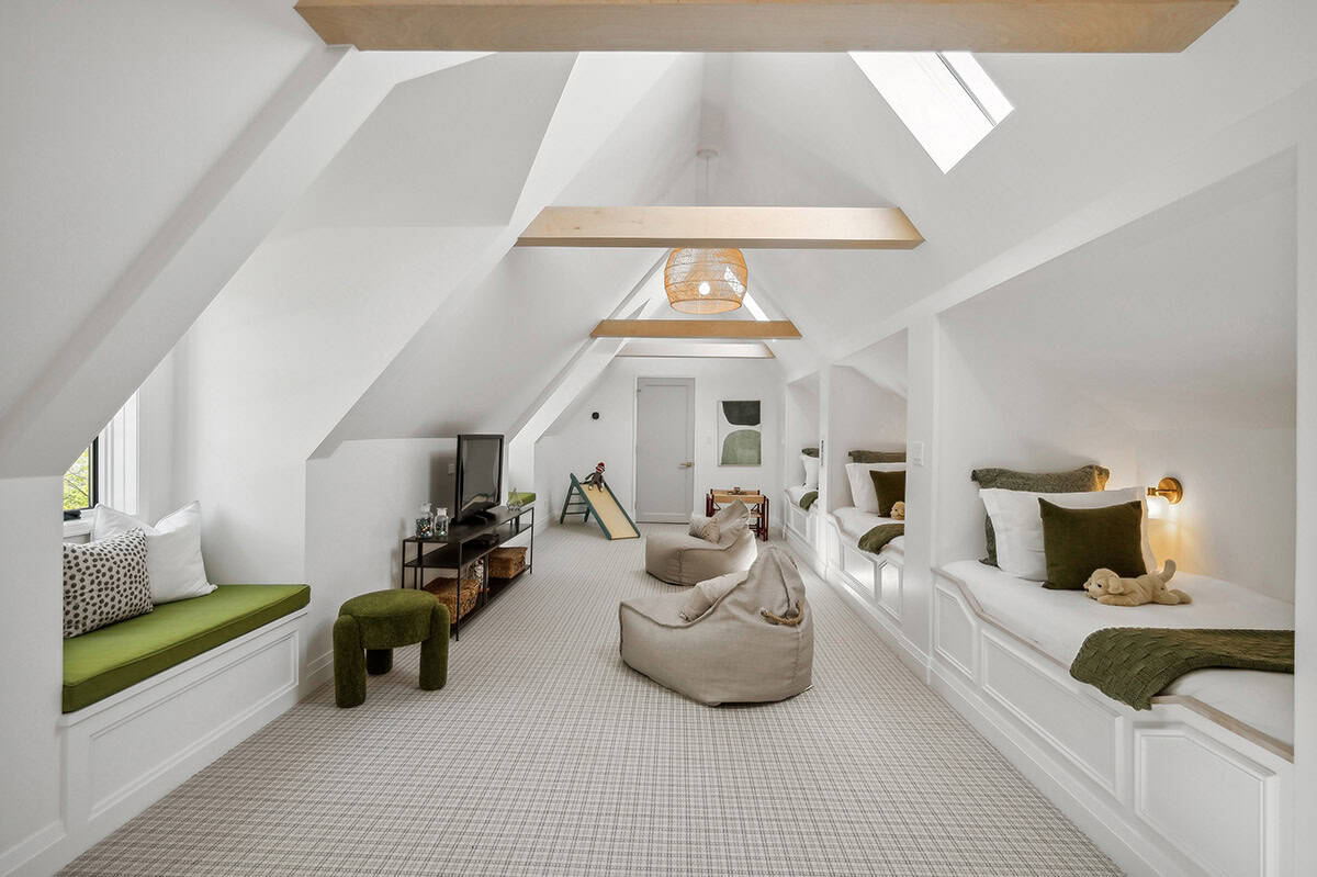 Attic bunk room with skylights and built in daybeds