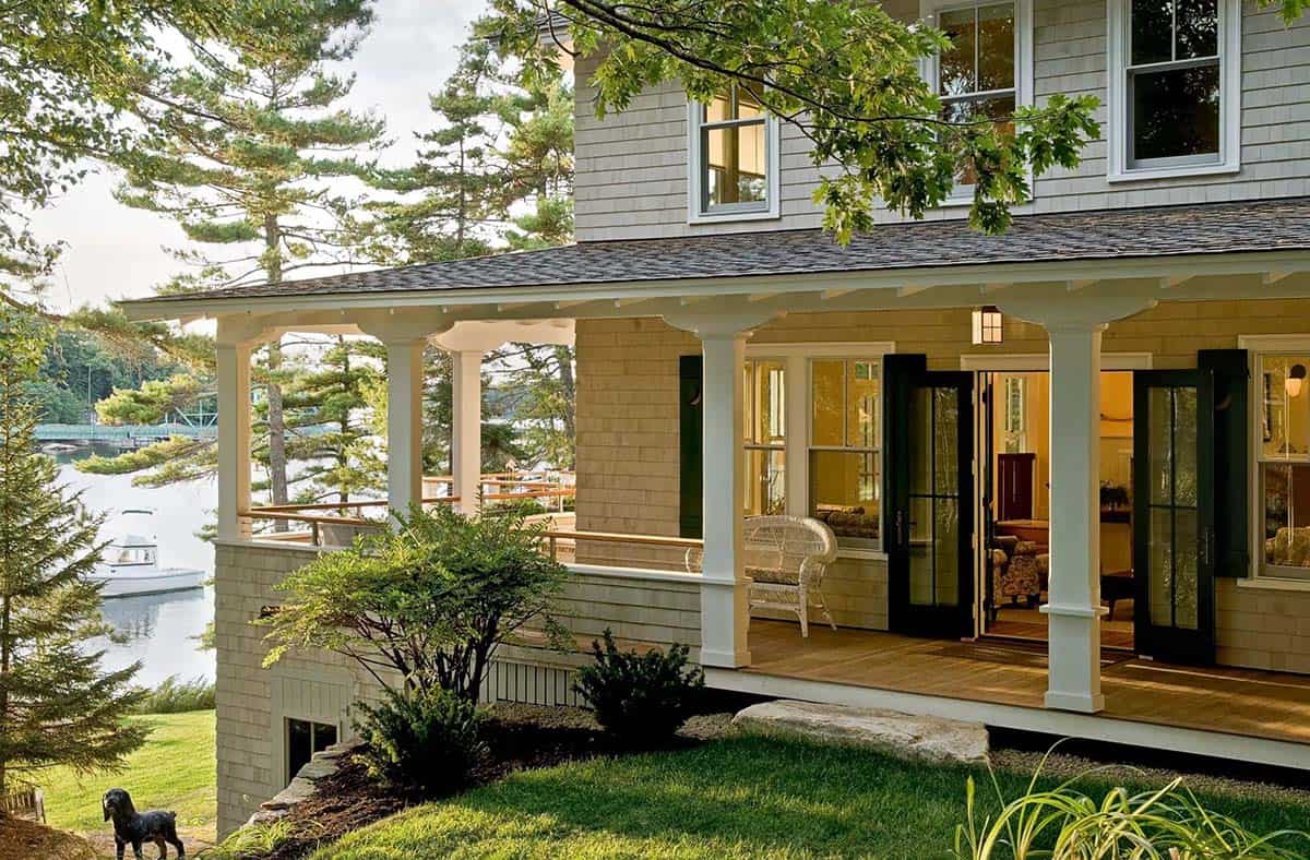 Wraparound porch overlooking Boothbay Harbor with boat dock views