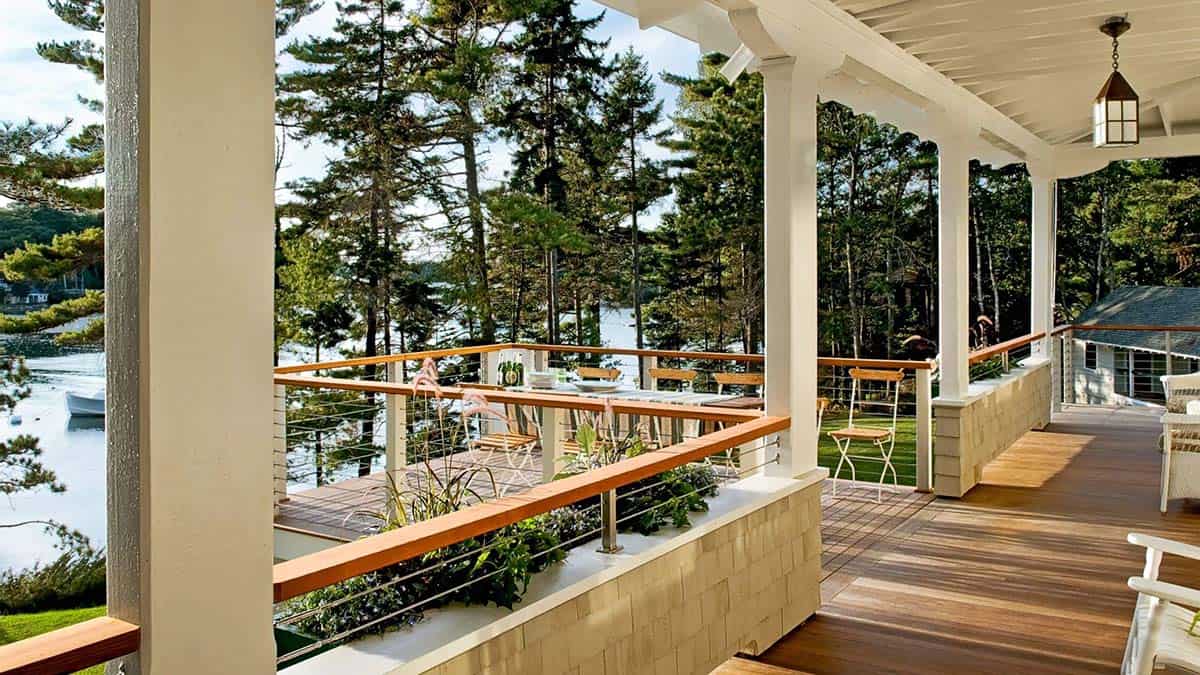 Upper deck with harbor and boat views through the trees