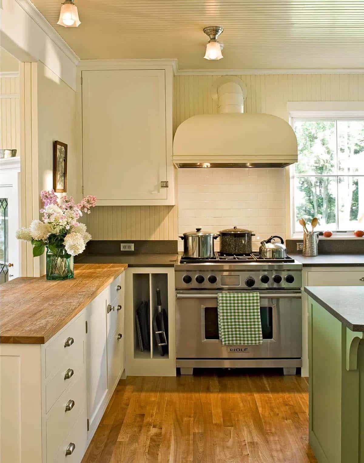 Cottage kitchen with Wolf range and green plaid towel