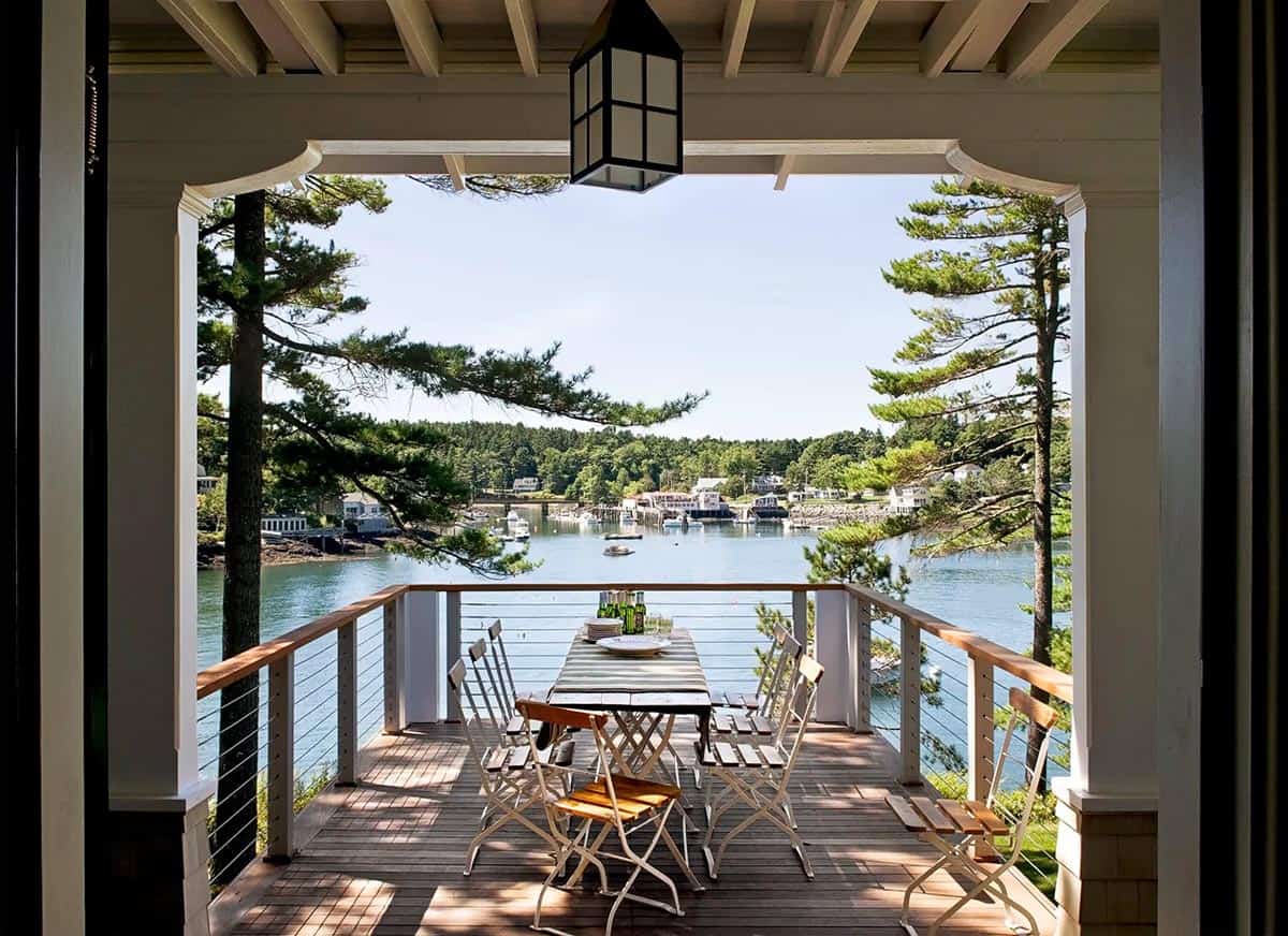Screened deck dining table overlooking Boothbay Harbor