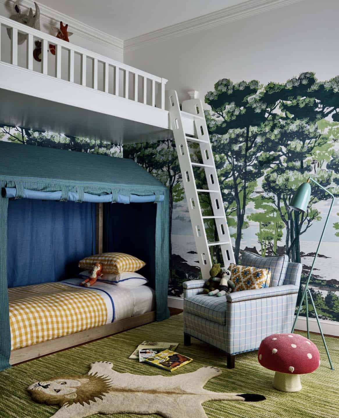 Child's bedroom with tented bunk bed and forest wallpaper mural