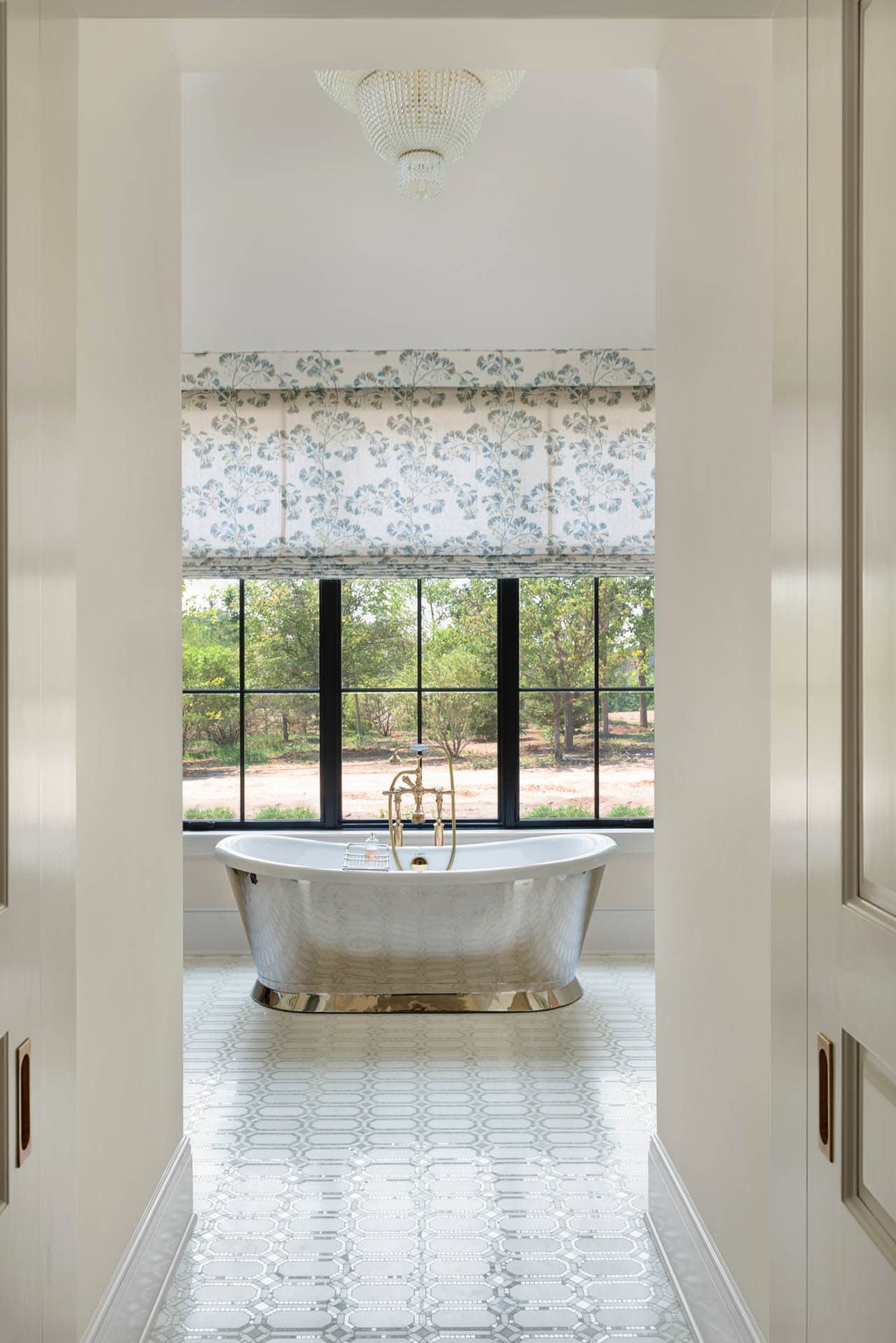 Primary bathroom with polished nickel soaking tub
