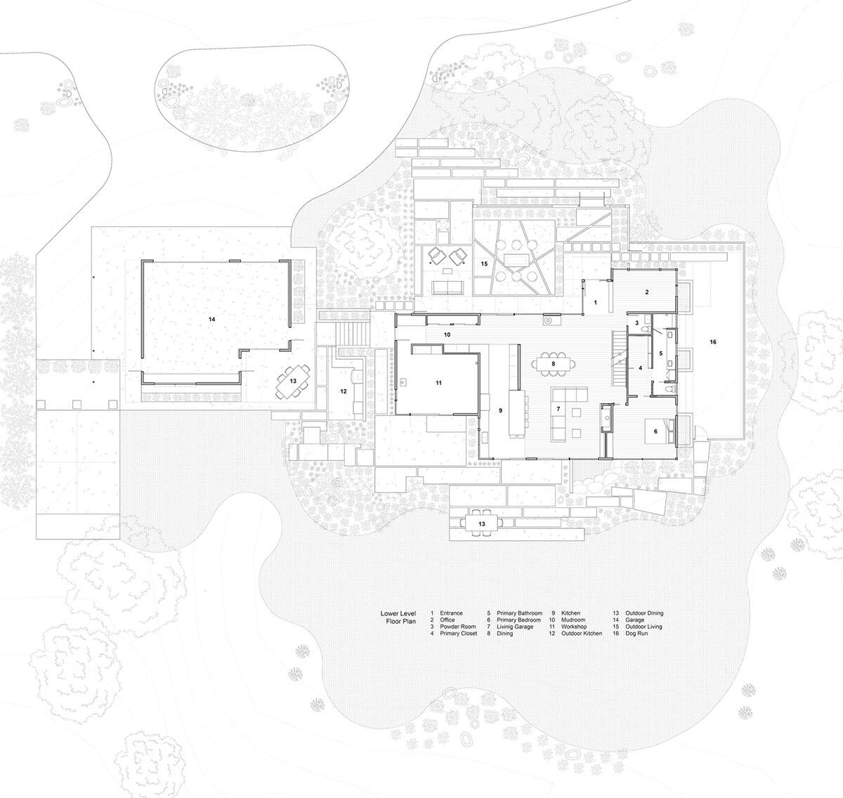 Architectural floor plan of the main level showing kitchen, living areas, primary suite, garage, and outdoor spaces