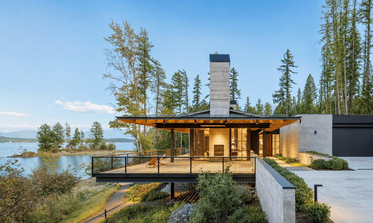Cantilevered deck overlooking Whitefish Lake at dusk