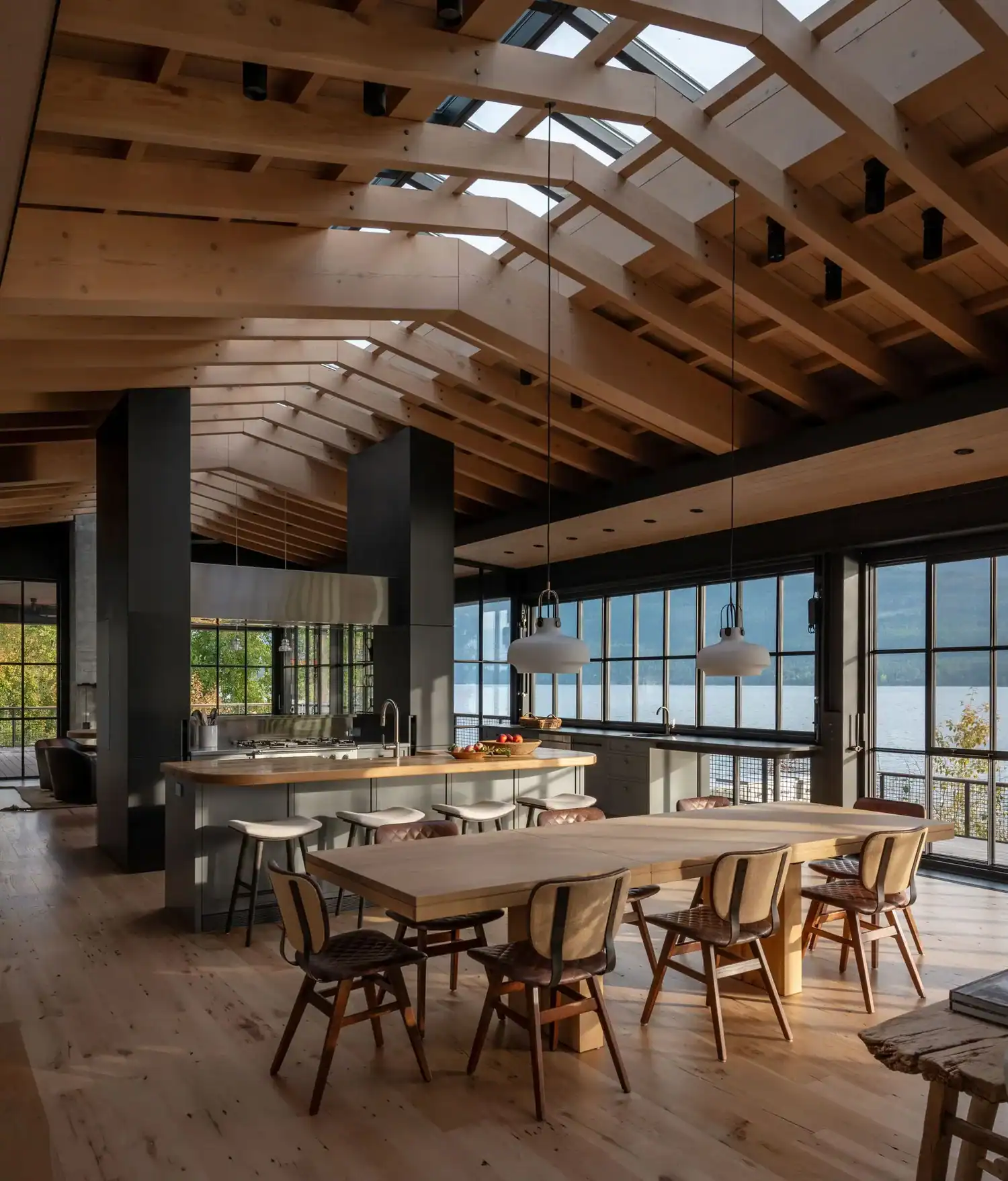 Kitchen and dining area with lake and mountain views