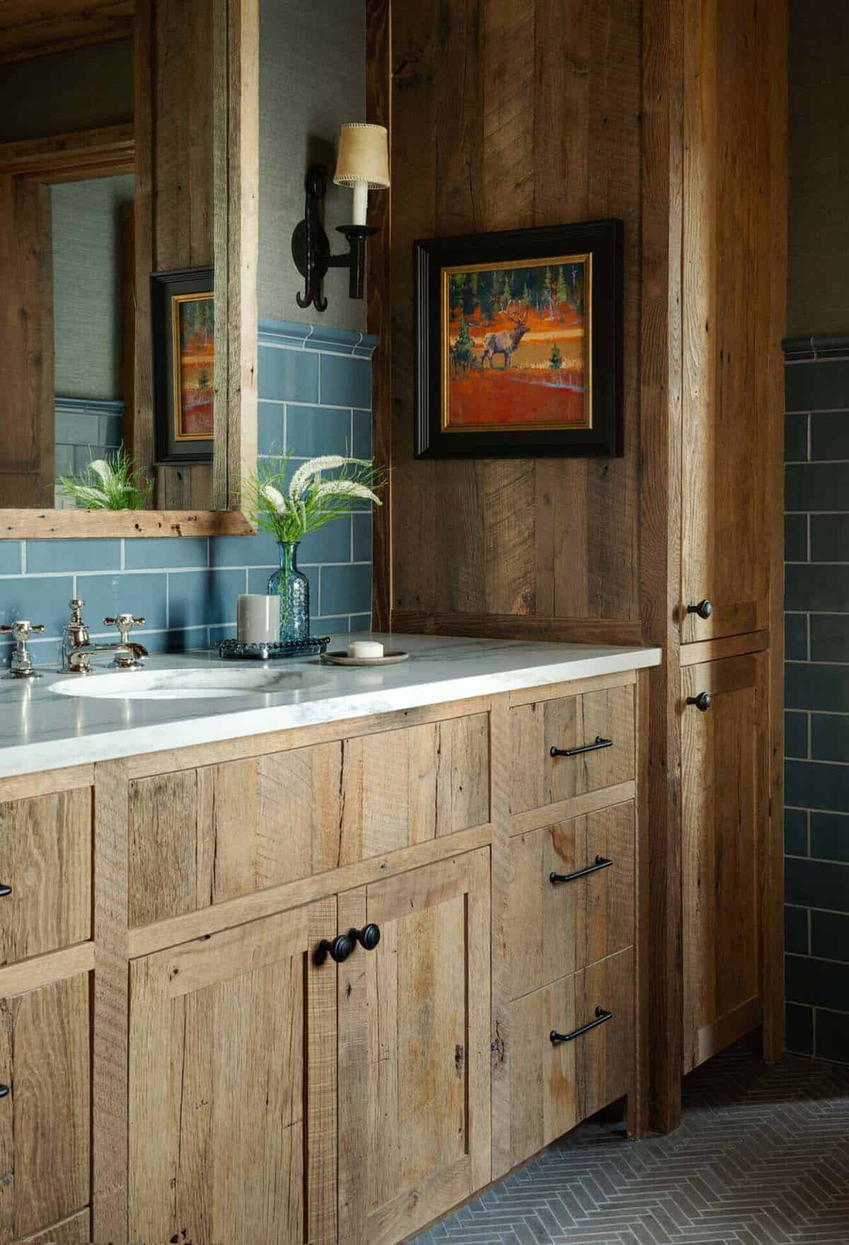 Bathroom vanity with reclaimed wood cabinetry and blue subway tile backsplash
