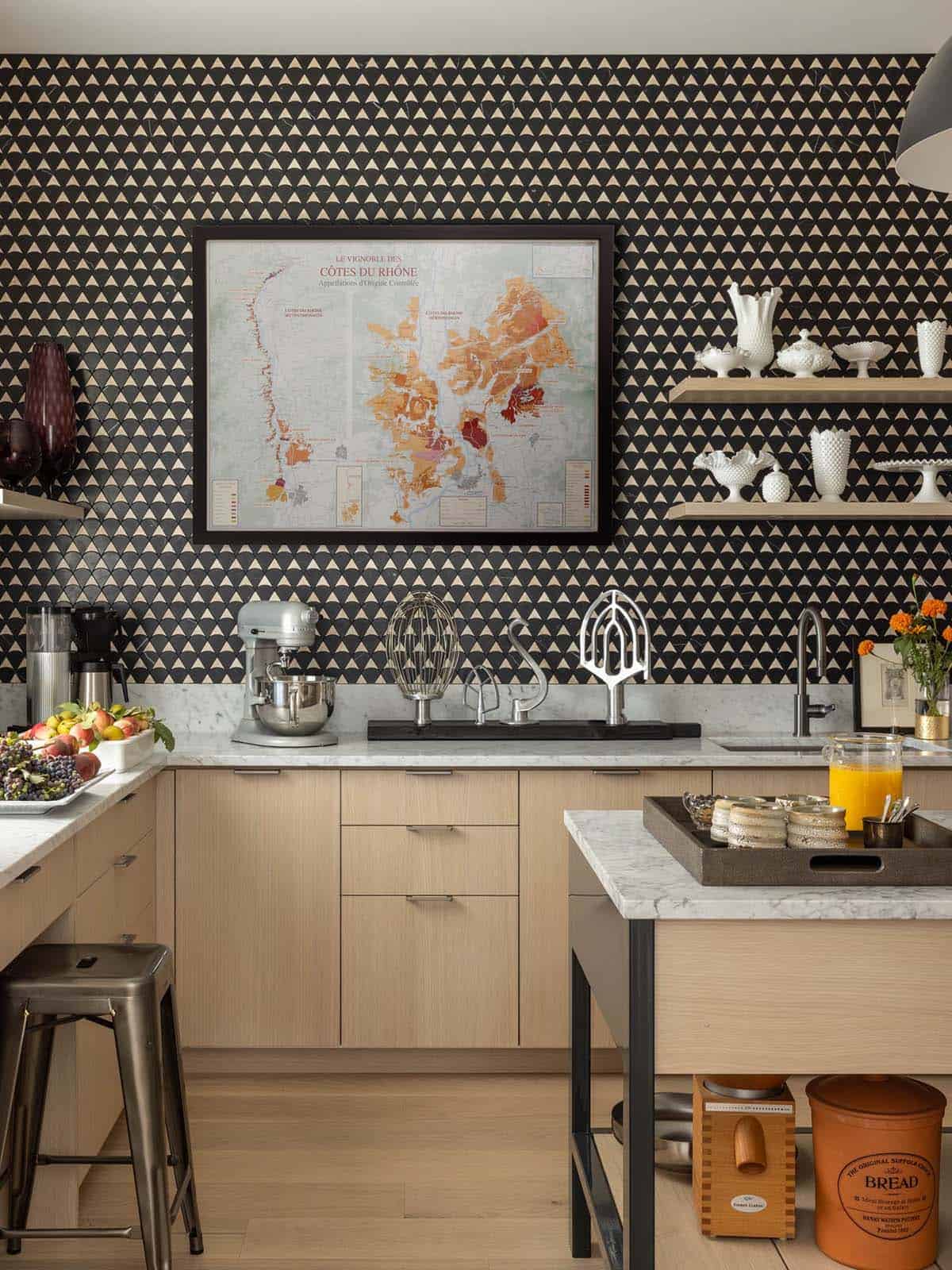 Butler's pantry with patterned wallpaper and vintage wine map