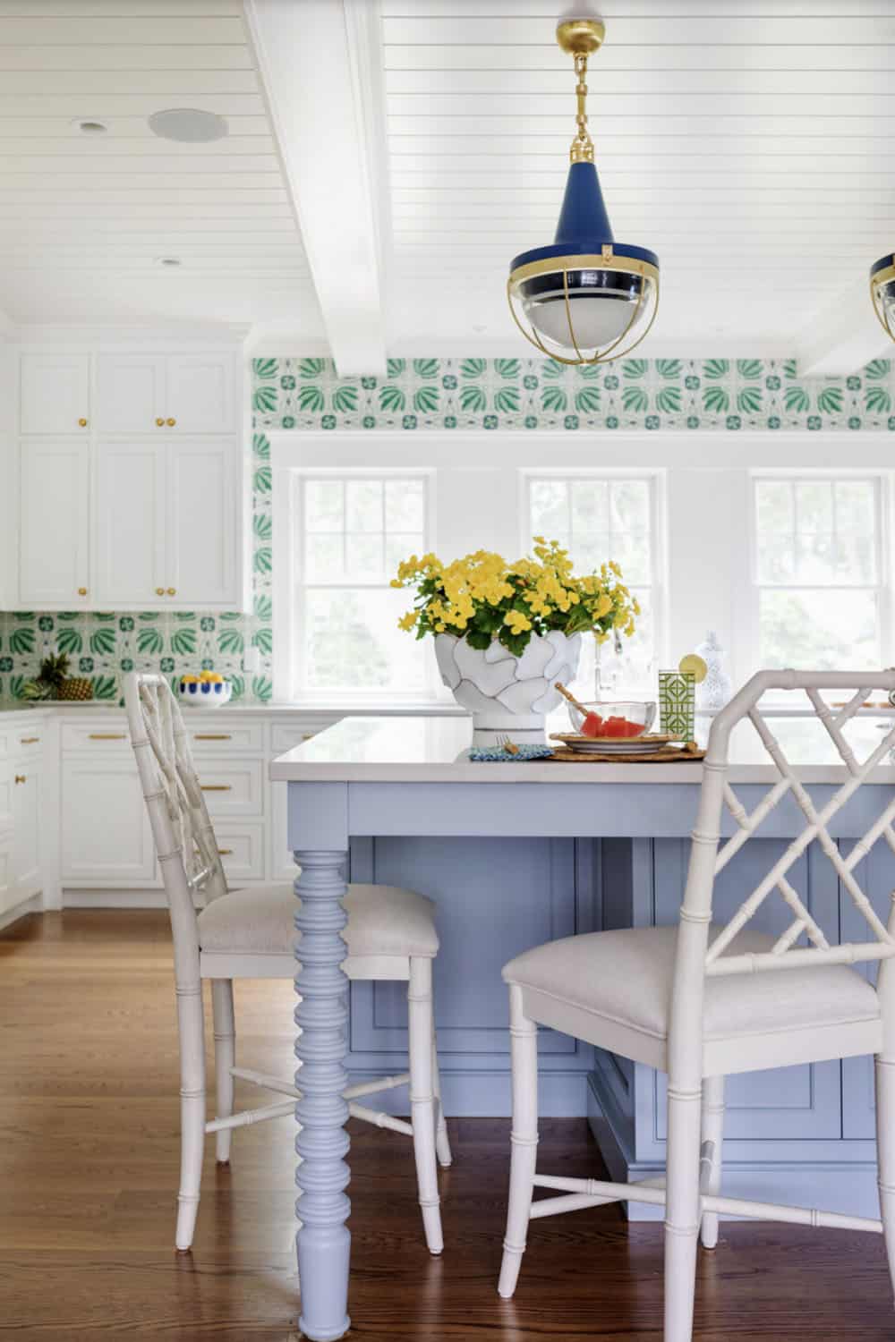 Kitchen island seating area with woven bamboo style counter stools