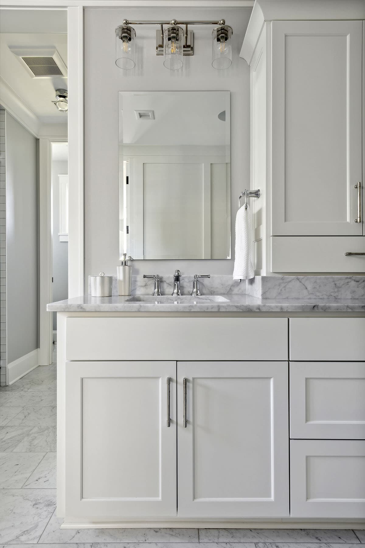 Bathroom vanity sink with mirror and pendant lighting
