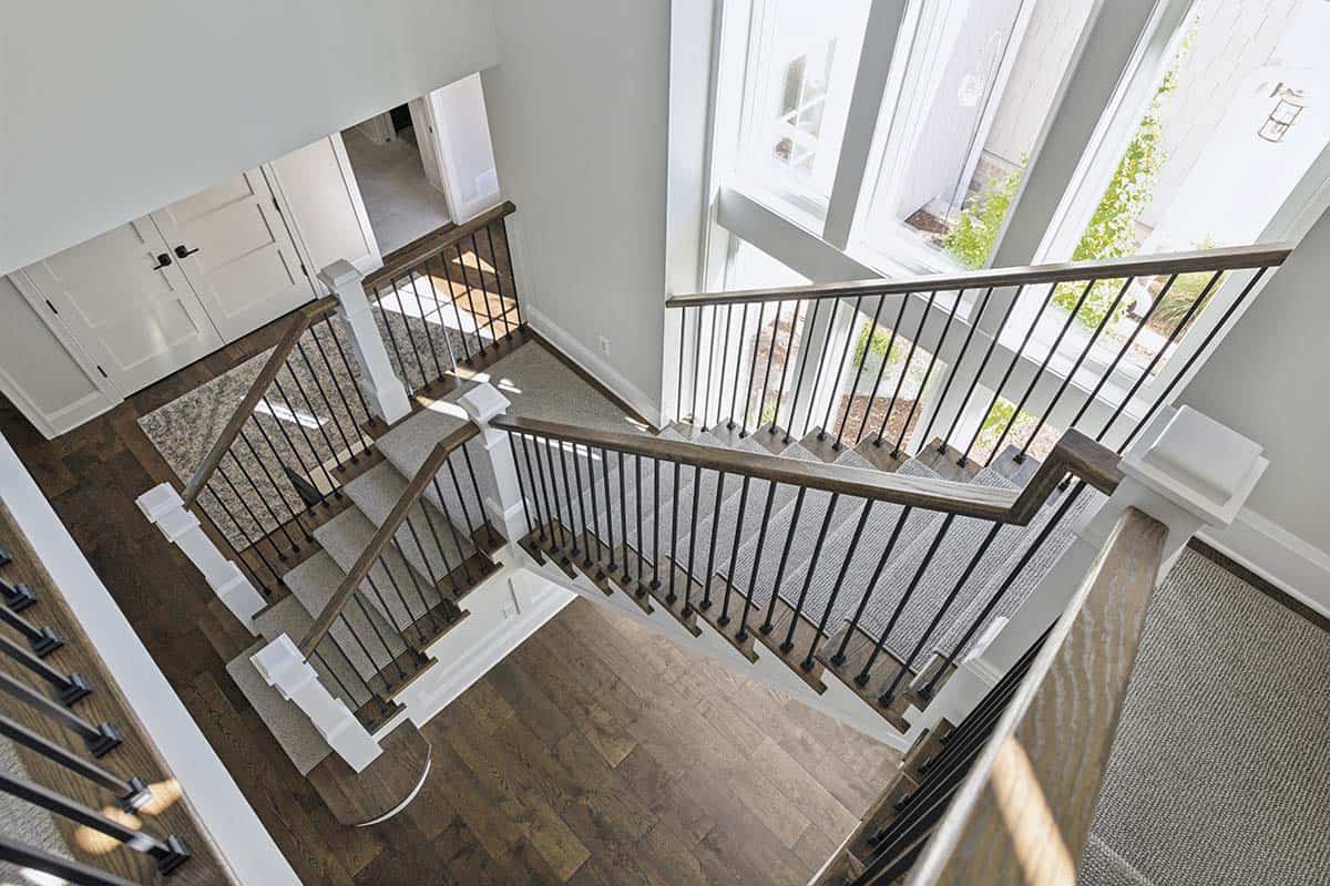 Aerial view of switchback staircase and foyer below