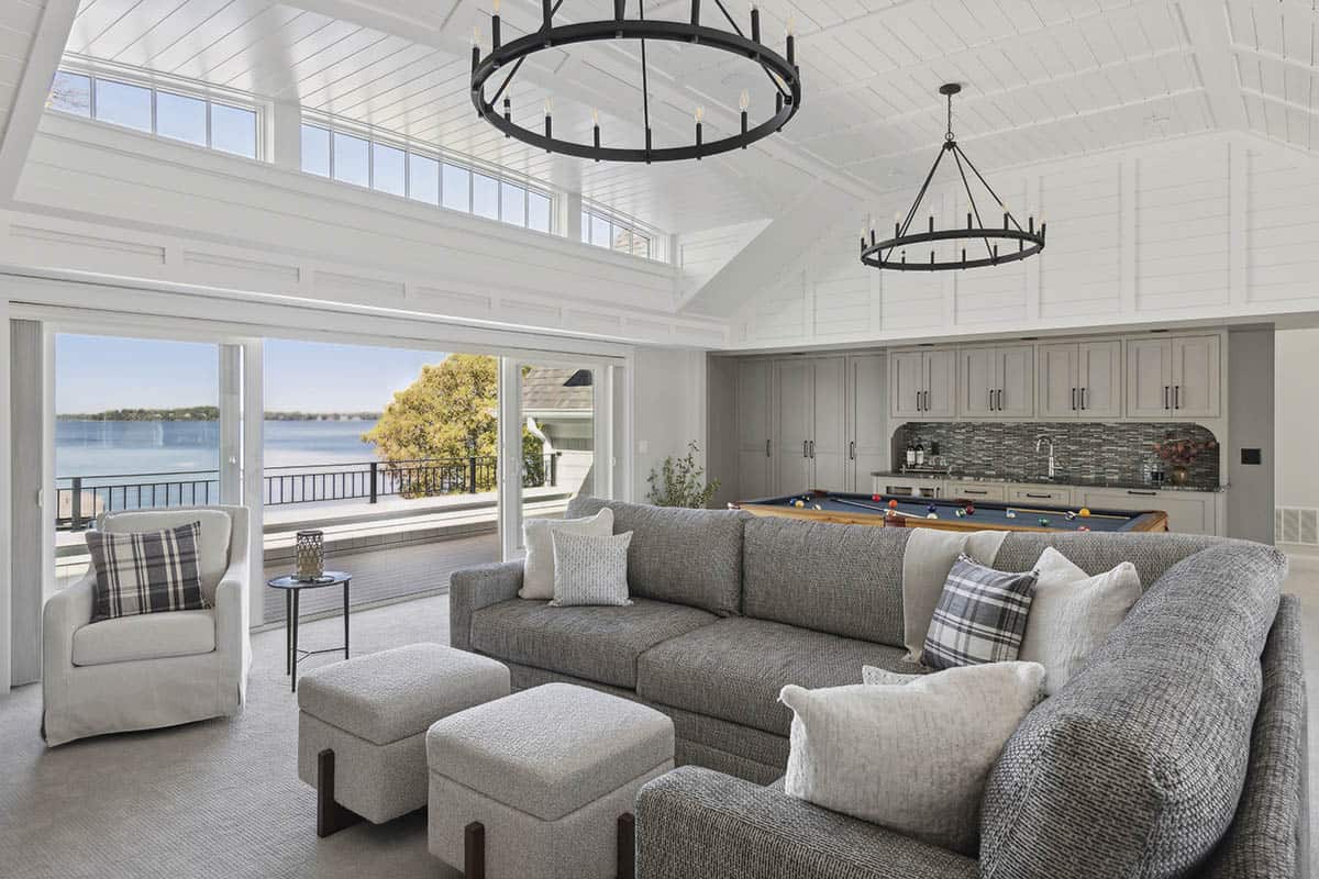 Wide view of family room with pool table and wet bar
