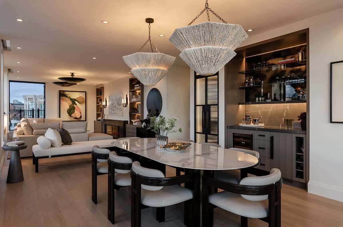 Dining room with woven pendant chandeliers and built-in bar