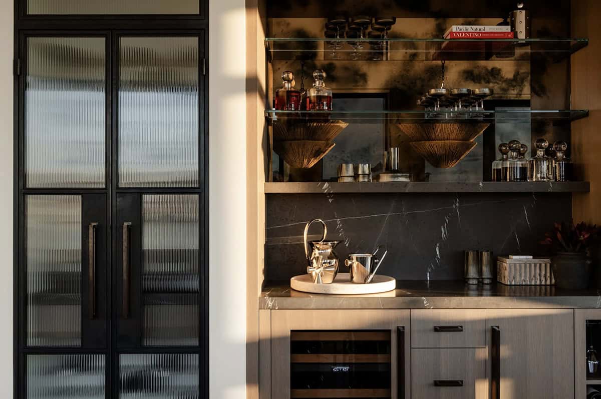 Wine cellar and bar shelving with antique mirror backdrop