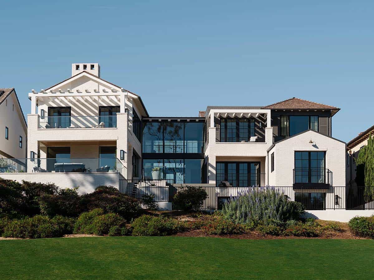 Exterior backyard view of modern home with landscaping