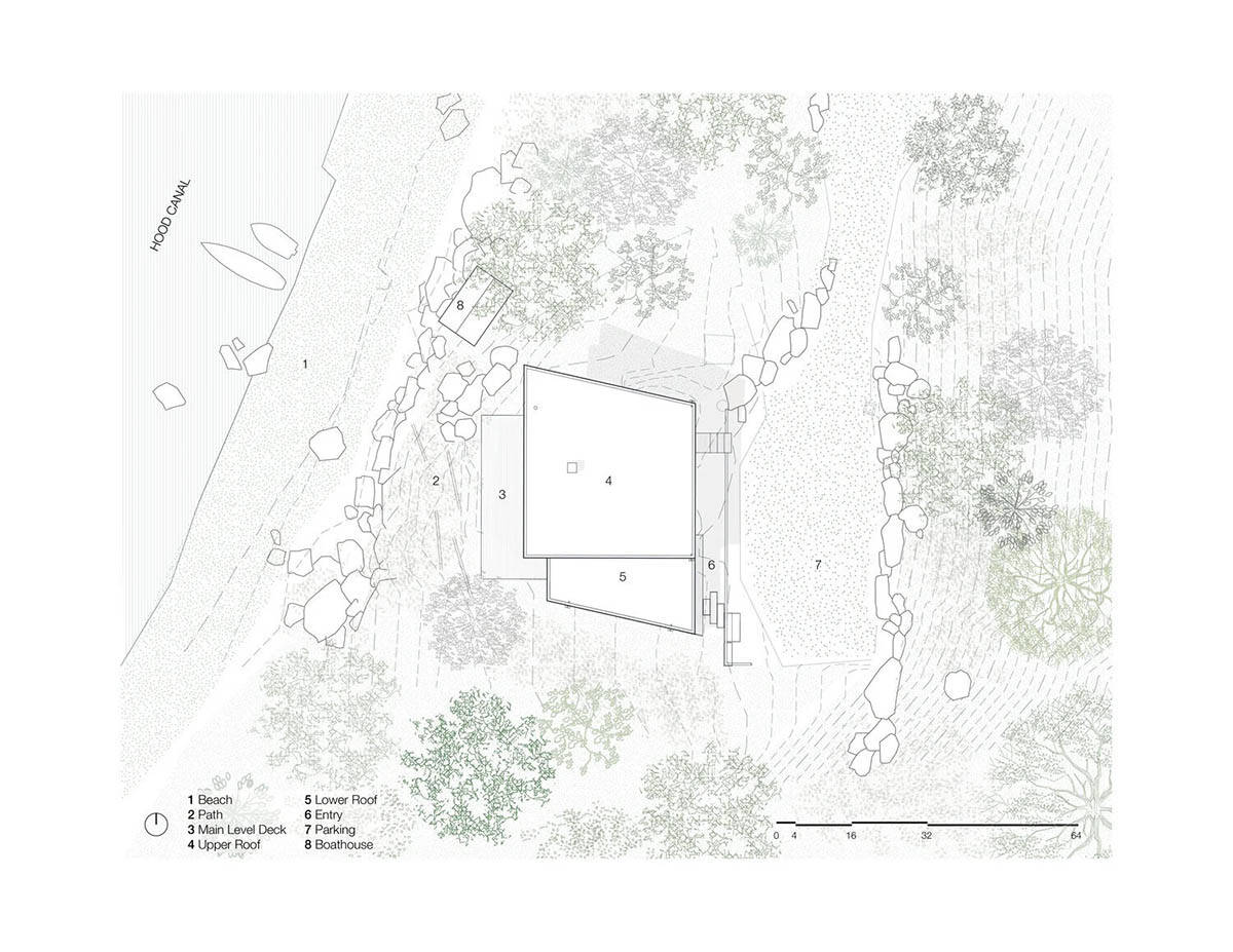 Site plan showing house footprint, deck, boathouse, and pathways relative to Hood Canal shoreline