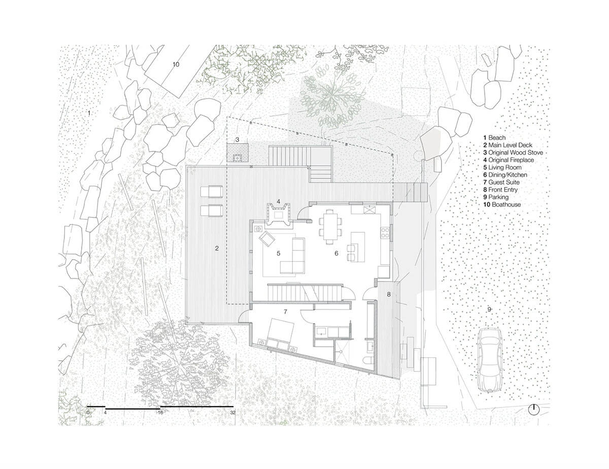 Floor plan of main level showing living room, dining/kitchen, guest suite, and deck layout