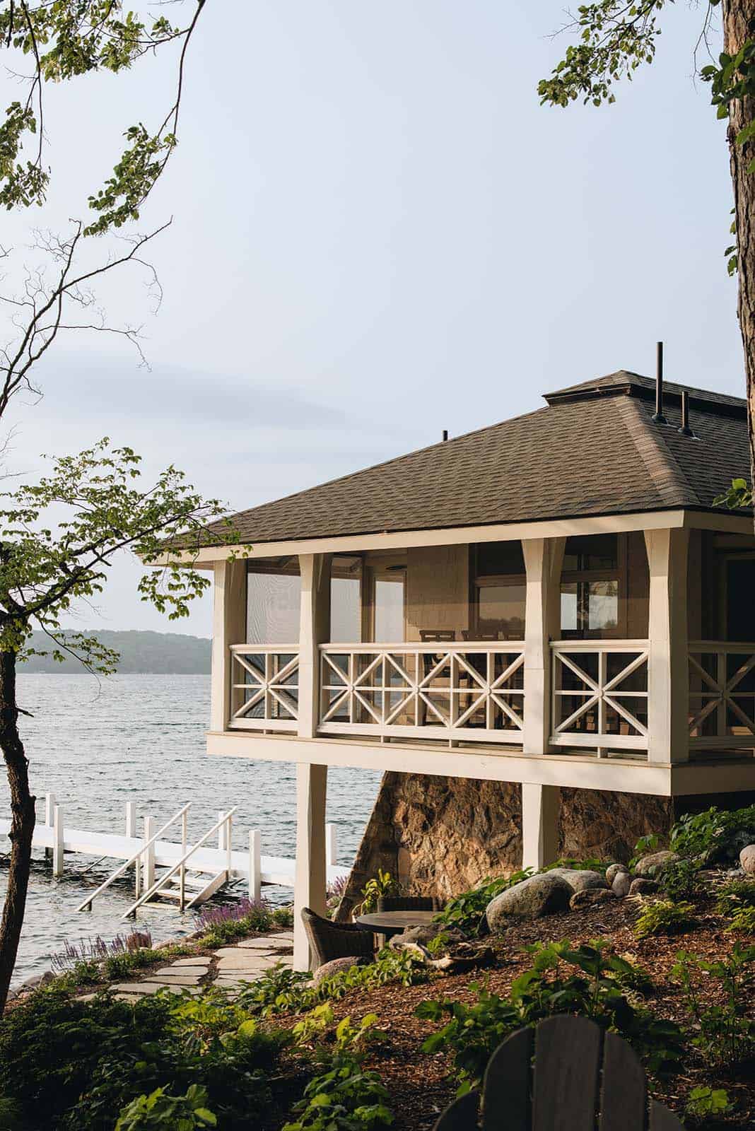 Boat house with screened porch overlooking Pine Lake and private dock