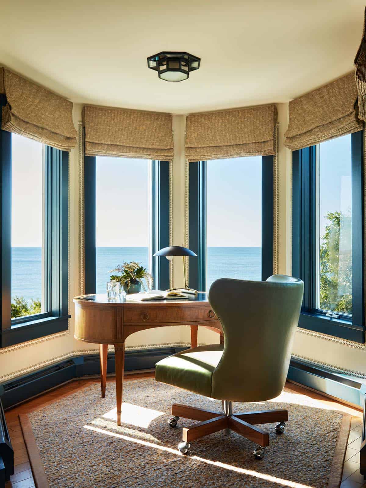 Corner office nook with bay windows overlooking the ocean