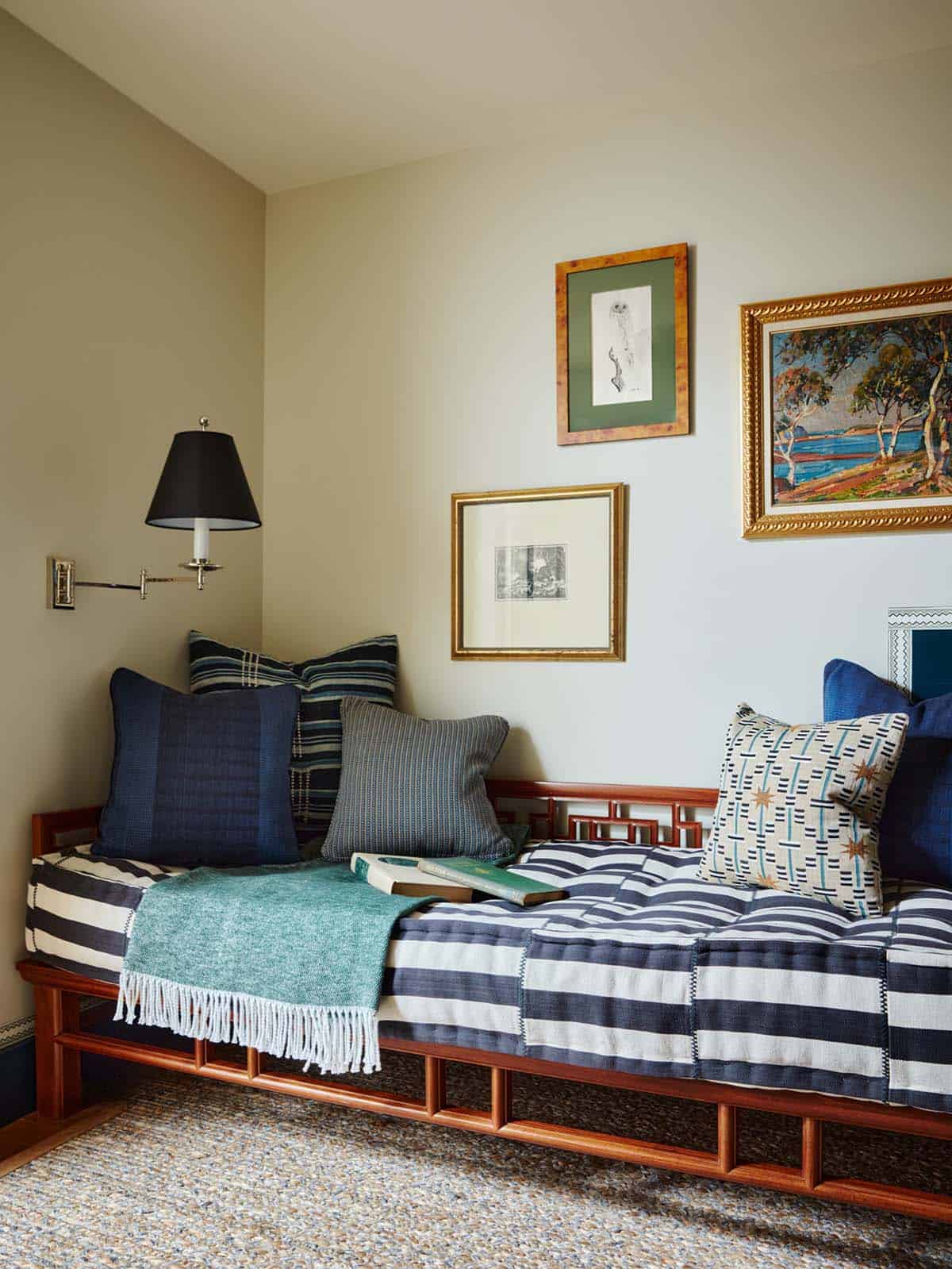 Daybed nook with striped bedding and mixed throw pillows