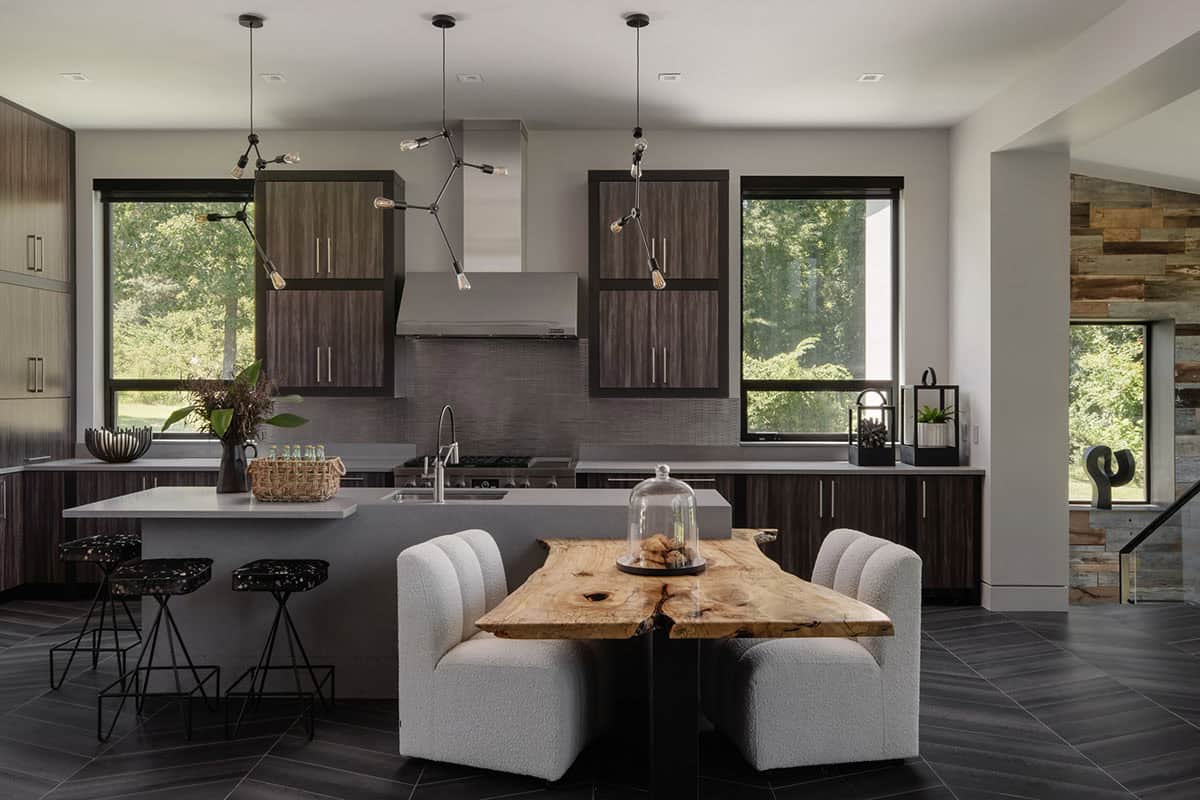 Kitchen nook with live-edge wood table and dark walnut cabinetry