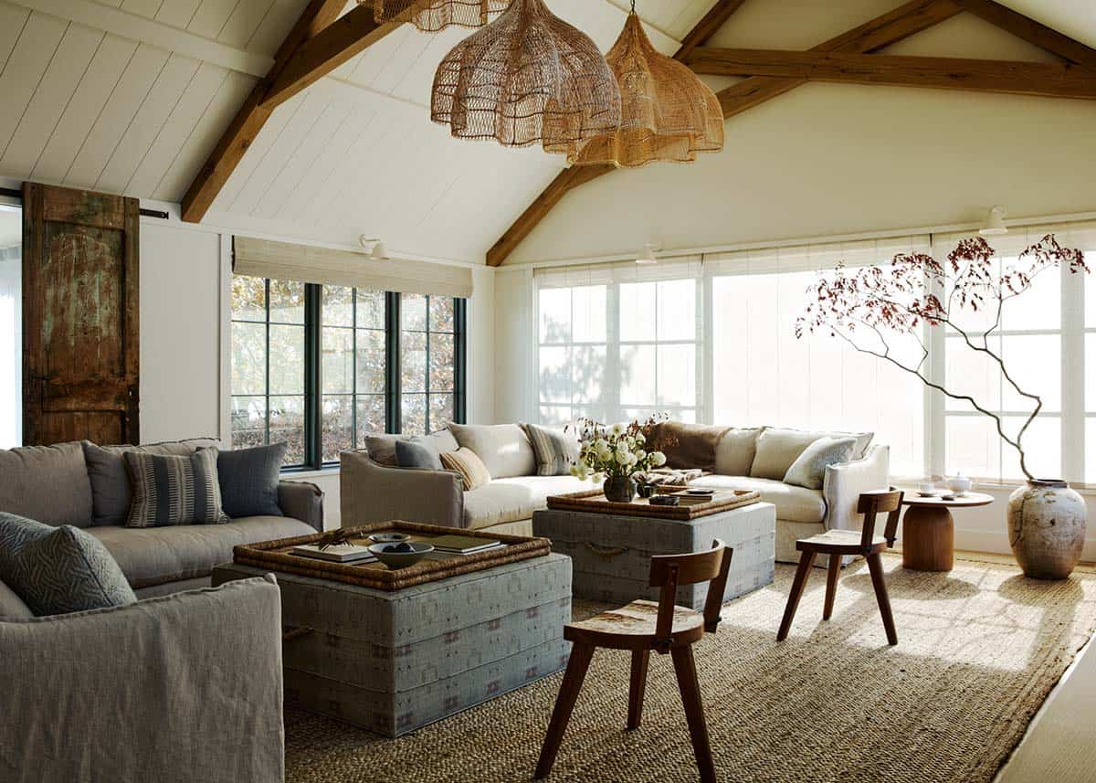 Living room with sectional sofa and floor-to-ceiling windows