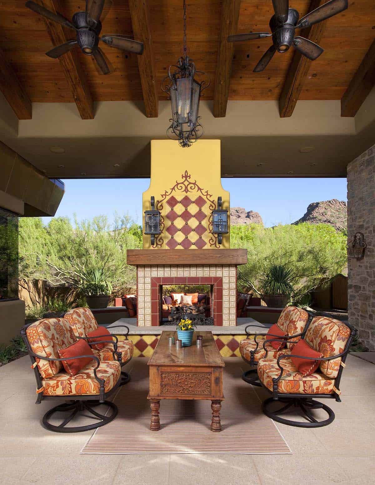 Double-sided tile fireplace in a Southwestern breezeway patio