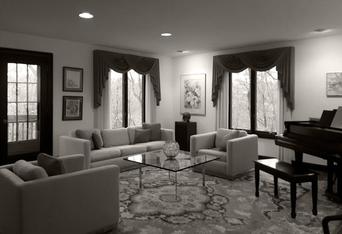 Original living room with swagged curtains and grand piano before renovation